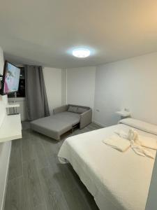 Postel nebo postele na pokoji v ubytování Loft Calypso