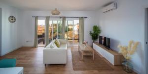 Televízia a/alebo spoločenská miestnosť v ubytovaní Luxury Casa del Sol Malaga centro