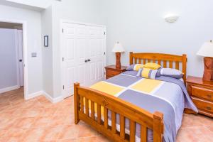 Letto o letti in una camera di Villa Lazy Daze
