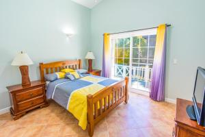 Letto o letti in una camera di Villa Lazy Daze