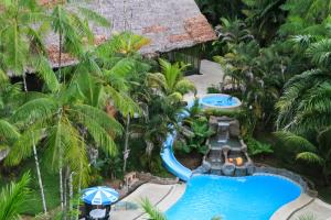 an aerial view of a pool at a resort at Ceiba Tops in Iquitos