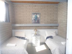 Postel nebo postele na pokoji v ubytování Motel Dimboola