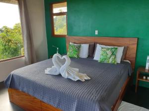 Postel nebo postele na pokoji v ubytování Palmetto Lodge + 37 fotografií