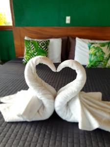 Ein Bett oder Betten in einem Zimmer der Unterkunft Palmetto Lodge