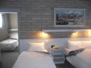 Postel nebo postele na pokoji v ubytování Motel Dimboola