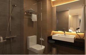 Ett badrum på Hotel Excelsior Ipoh