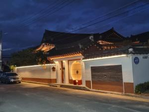 a building with a car parked in front of it at Yeonriji in Gyeongju