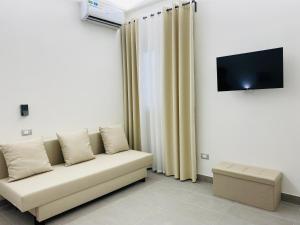 TV a/nebo společenská místnost v ubytování Sicilian Rooms