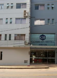 a building with a sign for a hotel at CAMBRAIA HOTEL ARCOS in Arcos