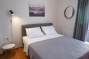 Postel nebo postele na pokoji v ubytování Oreon Suites - 'Ophelia'
