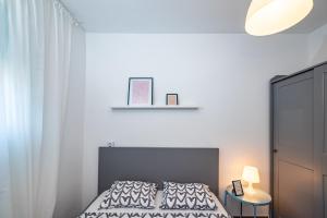 Postel nebo postele na pokoji v ubytování Apartment Sunset Rovanjska