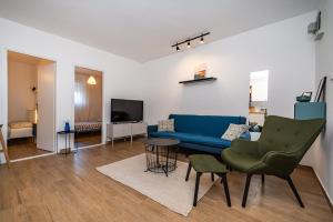 TV a/nebo společenská místnost v ubytování Apartment Sunset Rovanjska