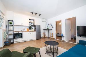 Kuchyň nebo kuchyňský kout v ubytování Apartment Sunset Rovanjska