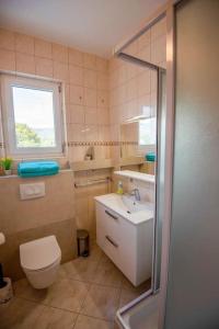 Kúpeľňa v ubytovaní VILLA OLEA - ŠIBENIK