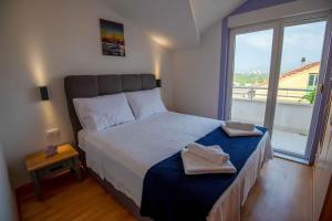 Posteľ alebo postele v izbe v ubytovaní VILLA OLEA - ŠIBENIK + 37 fotografií