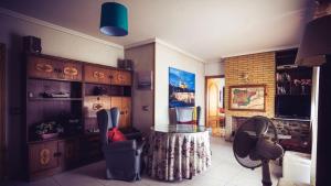 a room with a table and chairs in it at Casa rural Arribes Vida in Vitigudino