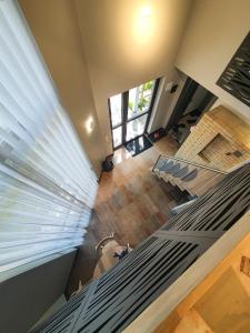 an overhead view of a room with a bed and chairs at Kotedža “Saules osta” in Saulkrasti +11 photos