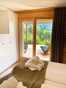 Postel nebo postele na pokoji v ubytování WOO® Loft Resort + 37 fotografií