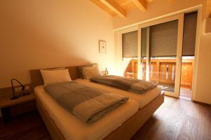 Łóżko lub łóżka w pokoju w obiekcie Mountain Penthouse Top 8 & 9