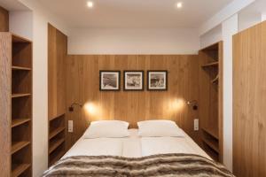 Posteľ alebo postele v izbe v ubytovaní ArlBerglife Ferienresort + 37 fotografií