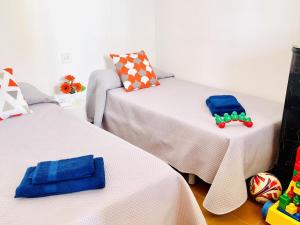Posteľ alebo postele v izbe v ubytovaní APARTBEACH BALANDRO CLIMATIZADO y VISTAS MAR