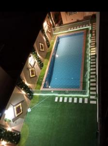 Výhled na bazén z ubytování Swat Olaya Hotel Apartments nebo okolí