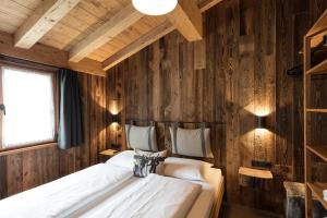 Posteľ alebo postele v izbe v ubytovaní ArlBerglife Ferienresort