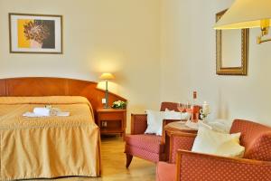 Postel nebo postele na pokoji v ubytování Hotel Rittinger + 31 fotografií