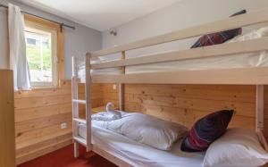 Postel nebo postele na pokoji v ubytování Hotel Le Refuge