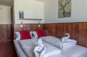 Postel nebo postele na pokoji v ubytování Hotel Le Refuge