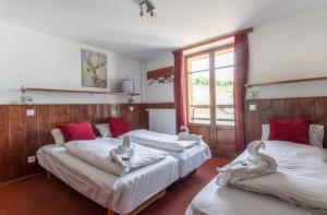 Postel nebo postele na pokoji v ubytování Hotel Le Refuge