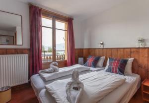 Postel nebo postele na pokoji v ubytování Hotel Le Refuge