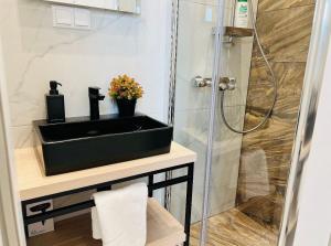Kúpeľňa v ubytovaní ZEUS Design Apartment Erlach #62