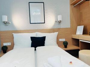 Posteľ alebo postele v izbe v ubytovaní ZEUS Design Apartment Erlach #62