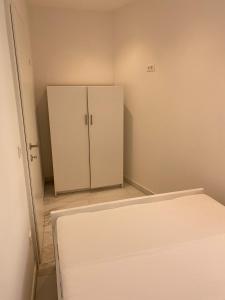 Posteľ alebo postele v izbe v ubytovaní Luxury Two-Bedroom Apartment with Two Private Parking
