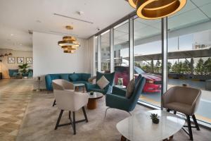 Posezení v ubytování Millennium Executive Apartments Mont Rose