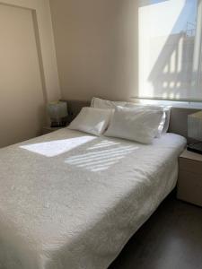 A bed or beds in a room at Apartamento de Lujo Benicasim - Primera Línea