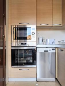 Kuchyňa alebo kuchynka v ubytovaní Espacioso apartamento de 2 dormitorios