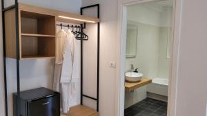 Koupelna v ubytování Theoxenia Hotel