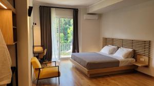 Postel nebo postele na pokoji v ubytování Theoxenia Hotel