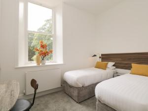 Cama o camas de una habitación en The Florence Suite Stone Cross Mansion