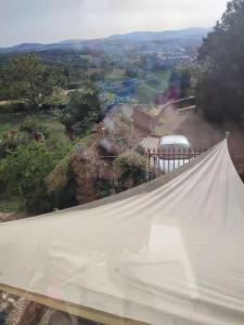 an aerial view of a large white tent at Le gîte des Pierres Dorées in Marcilly-dʼAzergues