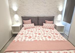 Postel nebo postele na pokoji v ubytování B&B Tra le vie del borgo