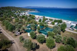 an aerial view of a resort near the ocean at Paliouri Luxury Bungalows in Paliouri