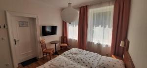 Postel nebo postele na pokoji v ubytování Schillers Landhaus