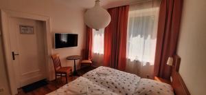 Postel nebo postele na pokoji v ubytování Schillers Landhaus