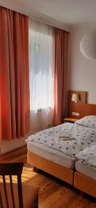 Postel nebo postele na pokoji v ubytování Schillers Landhaus