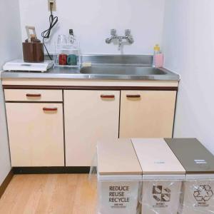 a kitchen with a sink and a box on the floor at Jinpachi Building - Vacation STAY 64315v in Gifu