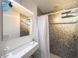 a bathroom with a sink and a shower at Basovizza 3 Alessandro Tirabora Short Rent in Villa Opicina