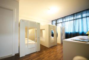 Posteľ alebo postele v izbe v ubytovaní Funk Lounge Hostel
